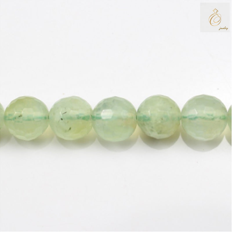 Natural prehnite beads strand, 4mm faceted round gemstone beads for jewelry making"
"Green prehnite gemstone beads, faceted round 4mm diameter, 99 pieces per strand"
"Faceted prehnite beads in soft green color, perfect for DIY jewelry projects