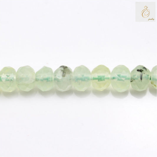 Natural prehnite faceted abacus beads 4x5mm on white background"
"Green prehnite gemstone beads strand for jewelry making"
"Faceted prehnite beads showing natural green color and sparkle"
"Close-up of natural prehnite abacus shaped beads with 1mm holes