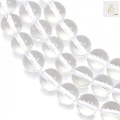 Natural clear rock crystal beads strand showing 10mm round gemstone beads with 1mm holes, perfect for jewelry making and crystal healing crafts