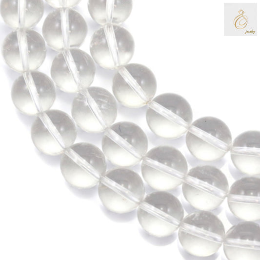 Natural clear rock crystal round beads 14mm diameter arranged in strand for jewelry making