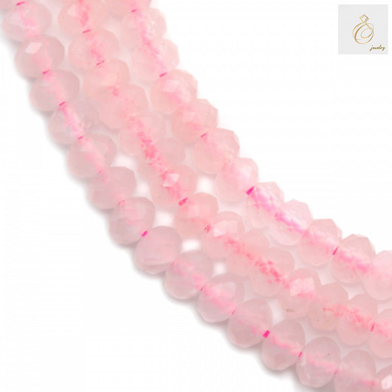 Natural rose quartz faceted abacus beads 3x4mm showing detailed texture and pink color