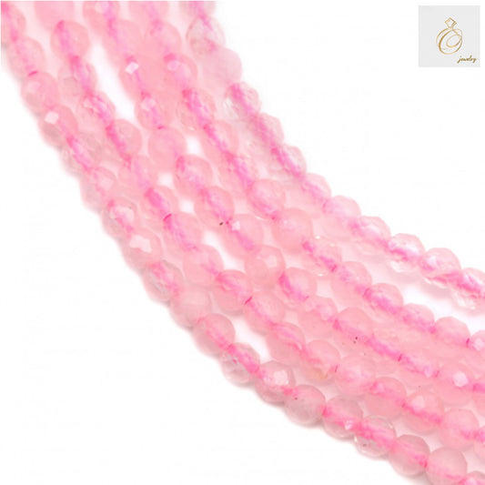 Natural rose quartz beads strand showing 2mm faceted round gemstone beads with pink translucent color