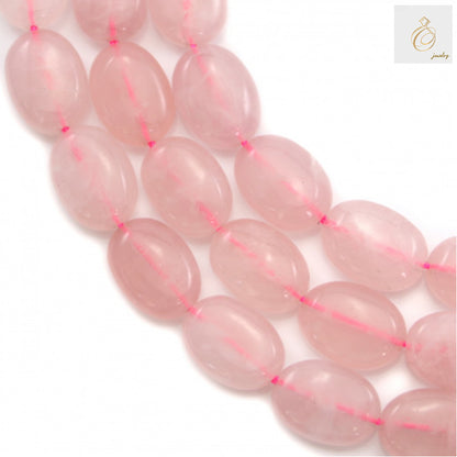 Natural rose quartz beads strand showing oval shaped gemstones 10x14mm with 1mm holes, approximately 29 pieces per strand