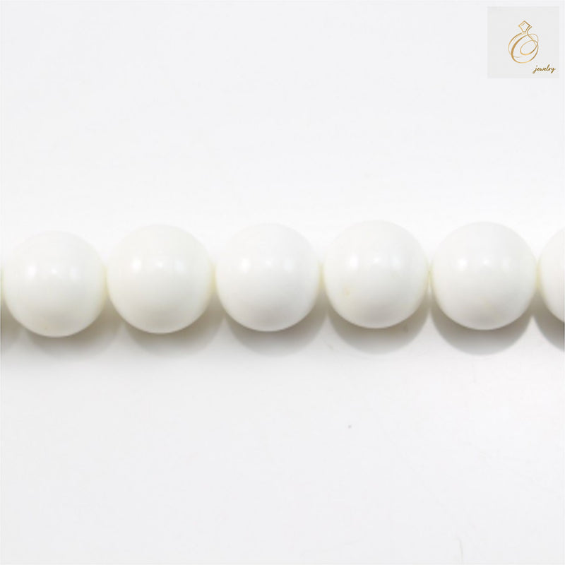 Natural Tridacnidae shell beads 14mm diameter on white background"
"Round polished Tridacnidae shell beads strand for jewelry making"
"Close-up of natural shell beads showing unique patterns and smooth finish