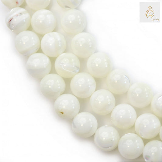 Close-up view of natural white mother-of-pearl shell beads displaying smooth round shape and 1mm holes for jewelry making