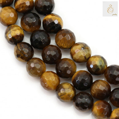 Natural yellow tiger's eye beads strand showing 8mm faceted round gemstone beads with golden-brown chatoyancy and silk-like luster