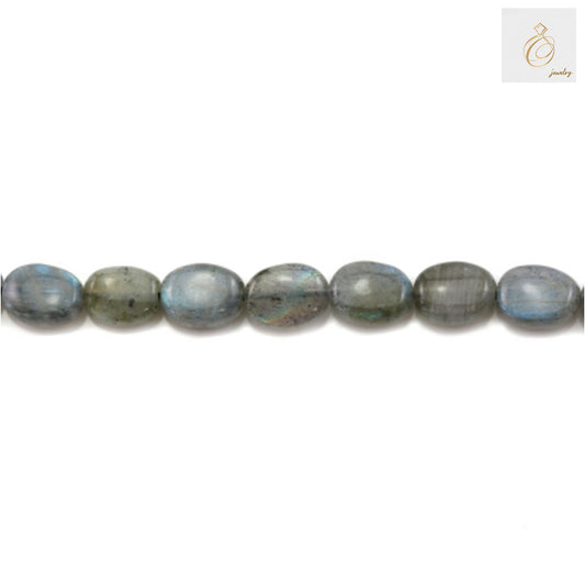Close-up of labradorite gemstone beads displaying iridescent colors