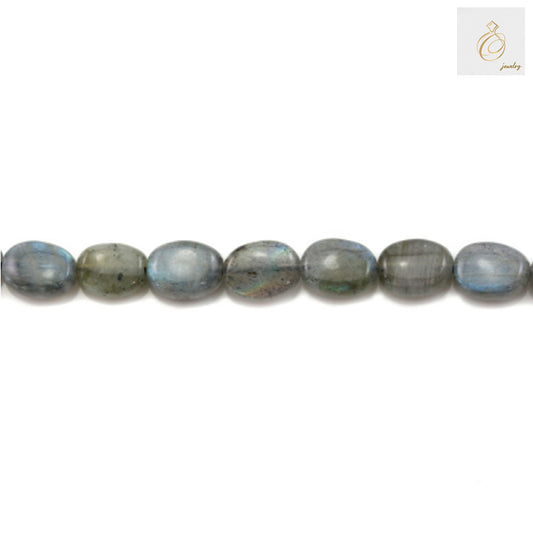 "Close-up view of natural labradorite oval beads showing color variations and quality"