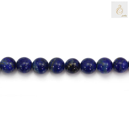 Premium blue lapis lazuli stone beads arranged in strand for crafting and jewelry design