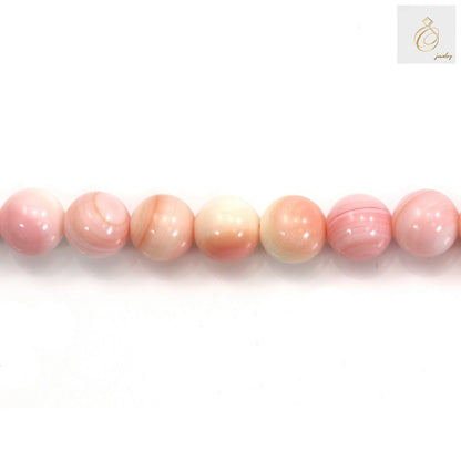 Natural pink mother of pearl shell beads strand showing lustrous round 10mm beads with smooth finish