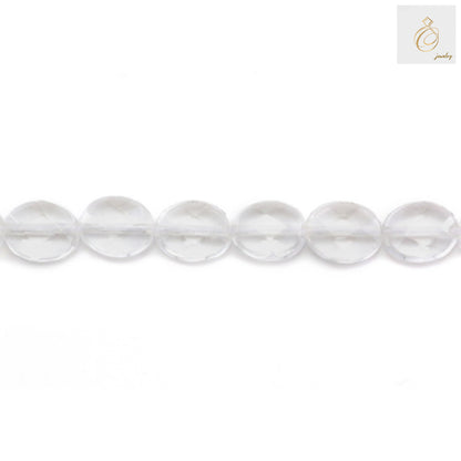 Close-up view of natural rock crystal beads displaying the faceted surface and oval shape, perfect for jewelry making