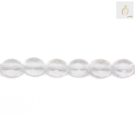 Close-up view of natural rock crystal beads displaying the faceted surface and oval shape, perfect for jewelry making
