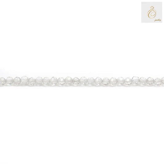 Close-up view of natural rock crystal beads displaying the precise 2mm diameter and faceted cut quality