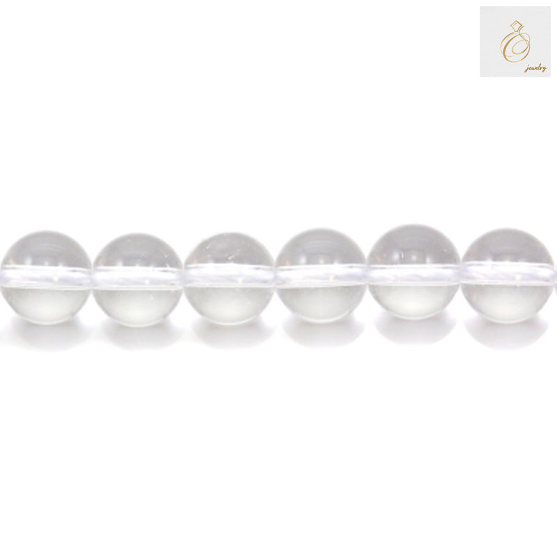 Close-up view of natural rock crystal beads showing transparency and quality, 12mm diameter gemstone beads for crafting