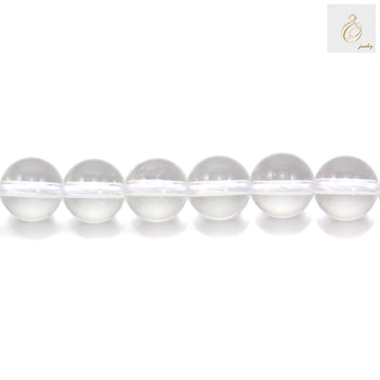 Close-up view of natural rock crystal beads showing transparency and quality, 12mm diameter gemstone beads for crafting