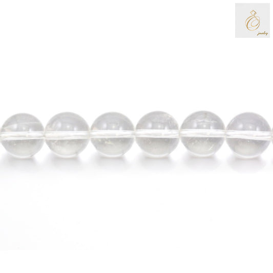 Close-up view of natural rock crystal beads showing transparency and quality