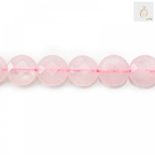Close-up of 10mm rose quartz beads showing faceted cut and natural pink color"
"Rose quartz gemstone beads with 1mm holes, perfect for stringing jewelry"
"Natural rose quartz bead strand containing approximately 39 pieces