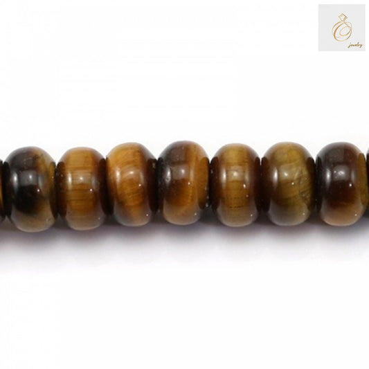 Close-up view of natural tiger's eye abacus beads displaying the characteristic golden bands and silky luster of the gemstone