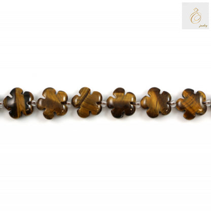 Close-up view of Natural Tiger's Eye beads displaying the distinctive golden shimmer and natural stone texture, perfect for jewelry making