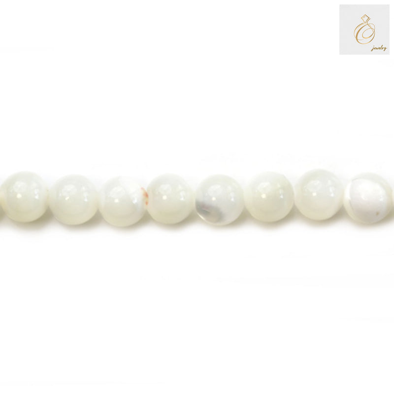 Natural white mother-of-pearl shell round beads 6mm diameter strand showing lustrous finish and uniform size