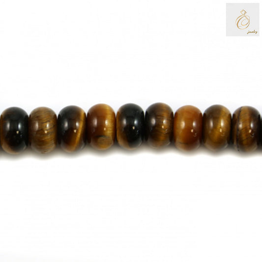 Close-up view of natural yellow tiger's eye abacus beads displaying the characteristic golden bands and lustrous surface