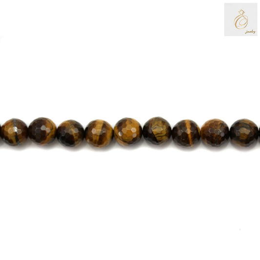 Close-up view of natural yellow tiger's eye beads displaying the lustrous golden-brown color and faceted surface detail