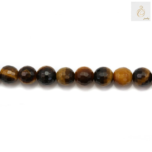 Close-up view of natural yellow tiger's eye beads displaying the characteristic golden shimmer and faceted surface detail