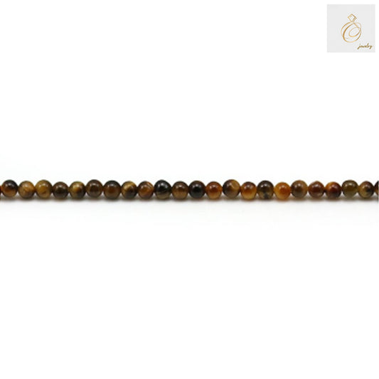 Close-up view of natural yellow tiger's eye beads showing golden-brown striped pattern and smooth round finish, 2mm size