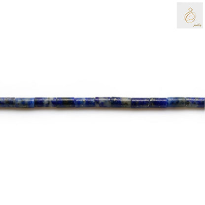 Close-up of natural lapis lazuli beads showing cylinder shape and 0.4mm hole"
"Strand of natural lapis lazuli cylinder beads for jewelry making