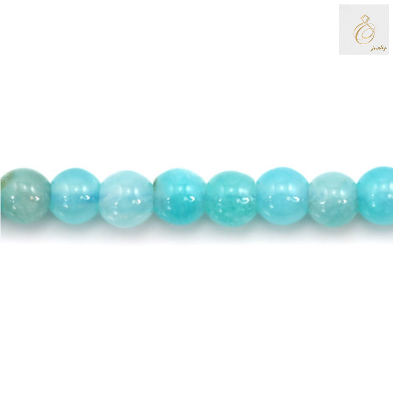 Detail view of Peruvian Amazonite bead texture and natural color patterns"
"Size comparison of 2mm Amazonite round beads next to ruler"
"Full length view of 39-40cm Amazonite bead strand