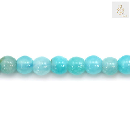 Detail view of Peruvian Amazonite bead texture and natural color patterns"
"Size comparison of 2mm Amazonite round beads next to ruler"
"Full length view of 39-40cm Amazonite bead strand