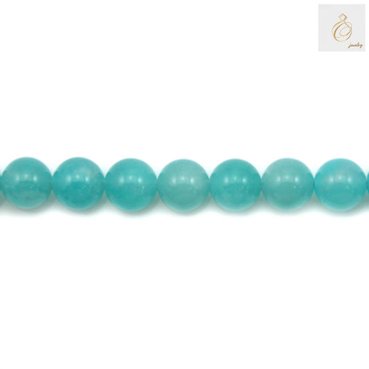 Close-up view of 8mm Peruvian Amazonite beads showing natural color variations"
"Amazonite round beads texture and polish detail
