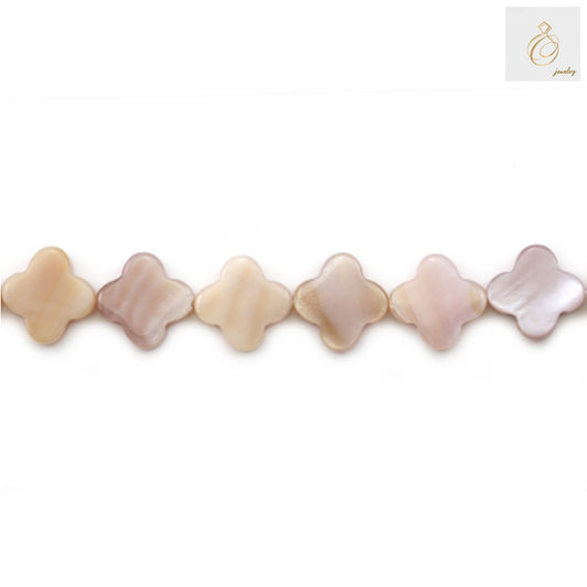 Pink mother-of-pearl shell clover beads, 10mm diameter with 0.7mm holes, arranged on strand showing natural iridescent finish and four-leaf clover shape