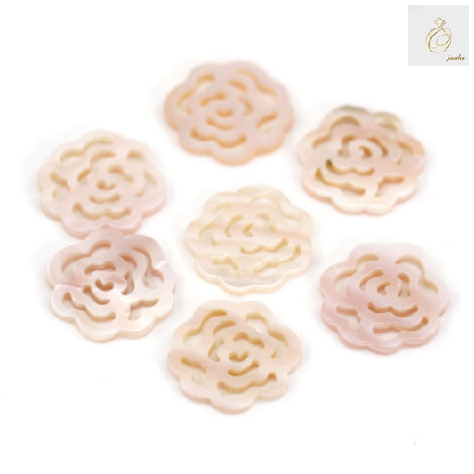 Pink mother-of-pearl shell flower bead, 15mm diameter, showing natural iridescent surface and delicate flower shape for jewelry making