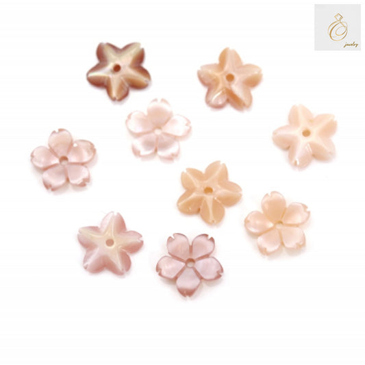 Pink mother-of-pearl flower charm 8mm - front view showing natural iridescent surface and delicate petal details