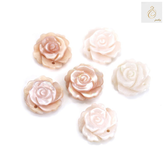 Pink mother-of-pearl rose cabochon 15mm diameter jewelry making supply showing lustrous surface detail