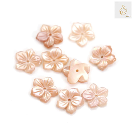 Pink mother-of-pearl shell flower charm 10mm - front view showing natural iridescent surface and delicate flower shape for jewelry making