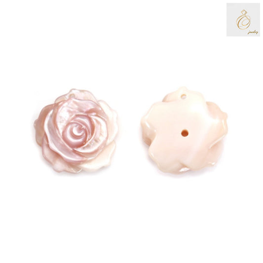 Pink mother-of-pearl rose cabochon 15mm close-up view displaying natural iridescent finish and smooth texture