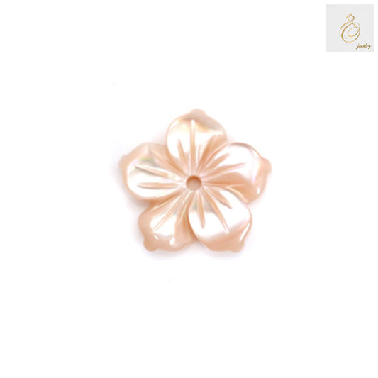Close-up view of pink mother-of-pearl shell flower showing natural iridescent finish