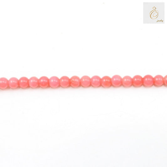 Pink sea bamboo round beads 4mm on white background"
"Natural pink bamboo beads strand for jewelry making"
"Close-up of pink sea bamboo round beads 4mm size