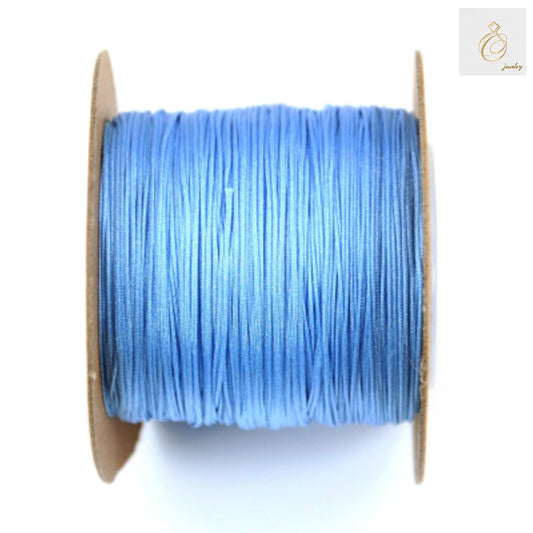 Blue polyester jewelry thread spool 0.5mm diameter for craft making"
"Premium blue polyester thread 180m spool for jewelry beading projects"
"High-quality 0.5mm blue craft thread on white spool for jewelry making