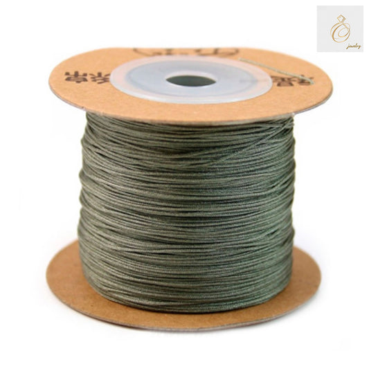Premium green polyester jewelry thread spool, 0.5mm diameter, 180-meter length for beading and jewelry making