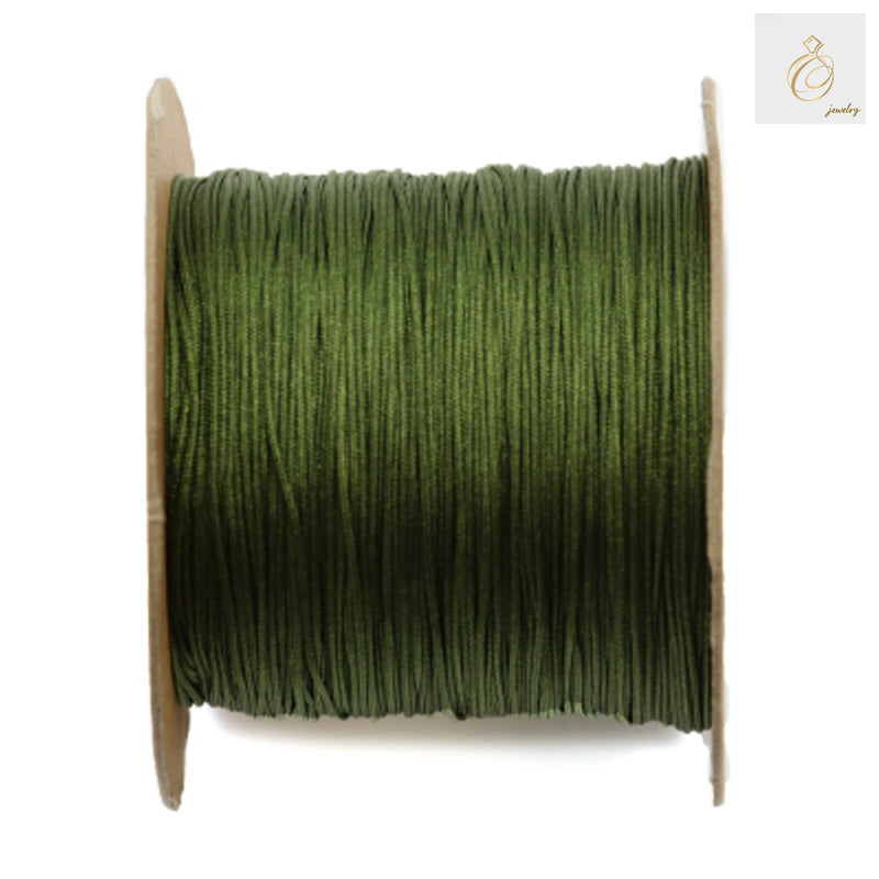 Green polyester jewelry thread spool 0.5mm diameter 180 meters"
"Premium green polyester thread for jewelry making and beading"
"High-quality 0.5mm green thread on spool for crafting
