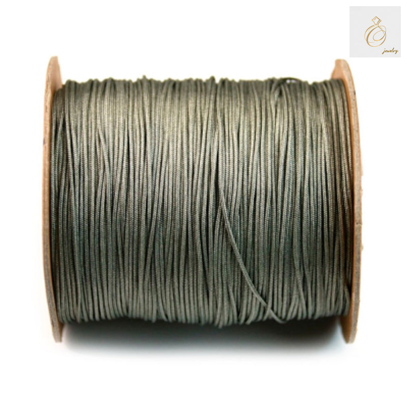 Premium green polyester thread 1mm diameter on 250m spool for jewelry making"
"High-quality green crafting thread 1mm x 250m for professional jewelry projects