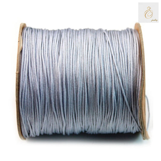 Grey polyester thread spool 1mm diameter 250 meters"
"Premium grey polyester sewing thread on spool"
"1mm grey polyester thread for sewing and crafting