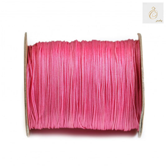 Pink polyester thread spool 1mm thickness 250 meters for sewing and crafting"
"High-quality pink polyester thread on white spool, 1mm diameter, 250m length"
"Vibrant pink sewing thread spool, polyester material, ideal for crafting projects