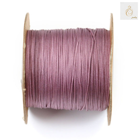 Premium violet polyester jewelry thread 0.5mm diameter on spool"