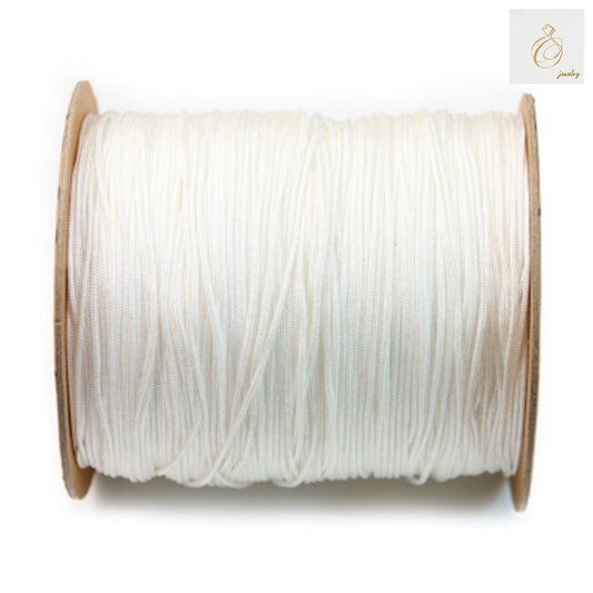 White polyester jewelry thread 1mm diameter on 250m spool"
"Premium white polyester thread for jewelry making and beading"
"Close-up of 1mm white polyester thread showing smooth texture 