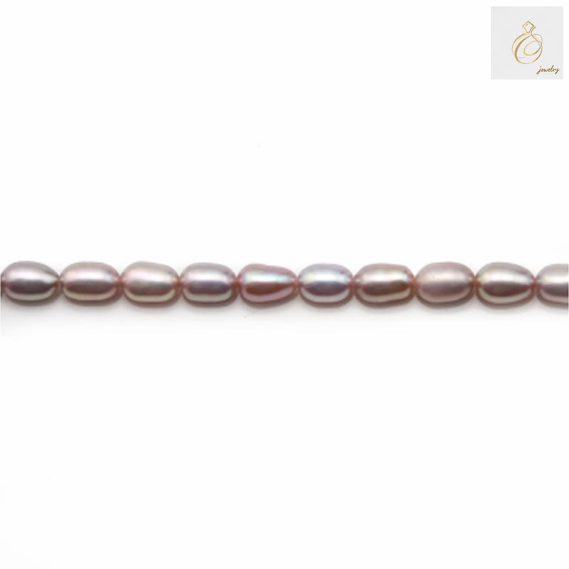Purple freshwater cultured pearl strand with oval 4-5mm pearls"
"Close-up of lustrous purple oval freshwater pearls"
"Purple cultured pearl necklace strand for jewelry making"