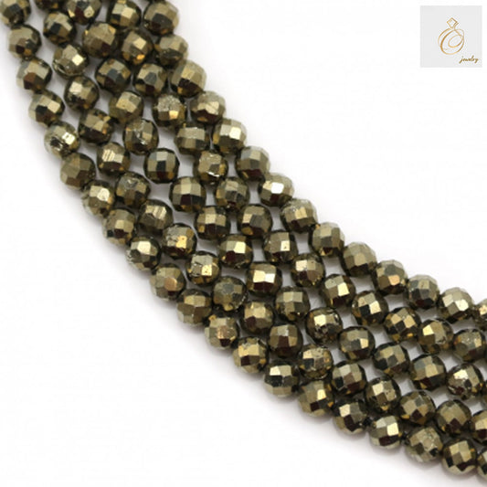 Pyrite faceted round beads 3mm diameter on strand, showing golden metallic luster and consistent sizing for jewelry making
